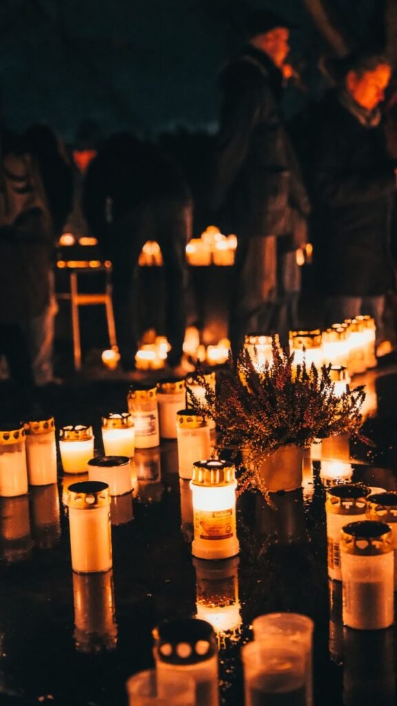 pexels-photo-14345791-14345791 A serene candlelight vigil in Stockholm, Sweden, reflecting peace and unity in a night setting.